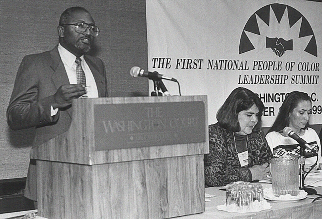 Dr. Robert D. Bullard delivering speech at podium.